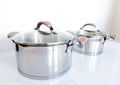 Stainless pots on a white background Royalty Free Stock Photo