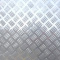 Stainless Steel background  with pattern checker plate design Royalty Free Stock Photo