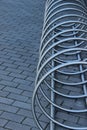 Stainless steel bicycle parking rack. Modern bicycle parking stand makes an abstract background