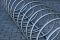 Stainless steel bicycle parking rack. Modern bicycle parking stand makes an abstract background