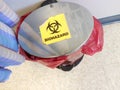 Stainless steel biohazard trash can medical office Royalty Free Stock Photo