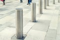 Stainless steel bollard entering pedestrian area on Vienna city street. Car and vehicle traffic access control Royalty Free Stock Photo