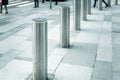 Stainless steel bollard entering pedestrian area on Vienna city street. Car and vehicle traffic access control Royalty Free Stock Photo