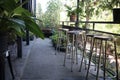 Stainless steel chair for relaxing corner in the garden, cafe, empty space pictures. Royalty Free Stock Photo