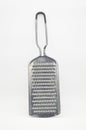 a stainless steel cheese grater isolated on a white background Royalty Free Stock Photo