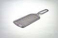 a stainless steel cheese grater isolated on a white background Royalty Free Stock Photo