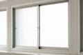Stainless steel clear glass window view inside house, interior closed white double panes frame with light background Royalty Free Stock Photo