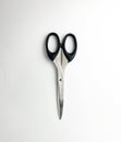 Closed scissors with black handle Royalty Free Stock Photo