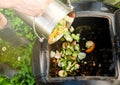 Stainless Steel Compost Bin with Various Food Scraps Royalty Free Stock Photo