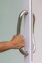 Stainless steel door handle. Royalty Free Stock Photo