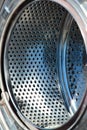 Stainless steel drum of an old washing machine Royalty Free Stock Photo
