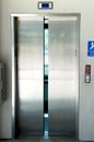 Stainless steel elevator doors closing Royalty Free Stock Photo