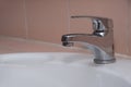 Stainless steel faucets with wash basins Royalty Free Stock Photo