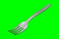 Stainless steel fork isolated in a green screen