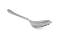 Stainless steel glossy metal kitchen spoon isolated Royalty Free Stock Photo