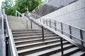 Stainless steel handrail Stone step in modern city Royalty Free Stock Photo