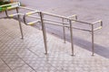 Stainless steel handrails are installed on the walls and steps.steel handrail.assistance for people with limited Royalty Free Stock Photo
