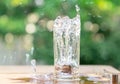 stainless steel ice  put a glass of water spread Royalty Free Stock Photo