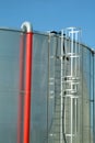 Stainless steel industrial oil reservoir Royalty Free Stock Photo