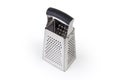 Stainless steel kitchen box grater with four different grating surfaces Royalty Free Stock Photo