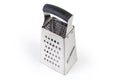 Stainless steel kitchen box grater with four different grating surfaces Royalty Free Stock Photo