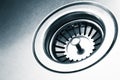 A stainless steel kitchen sink drain Royalty Free Stock Photo