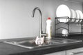 Stainless steel kitchen sink in modern kitchen interior background photo Royalty Free Stock Photo