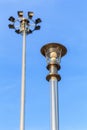 Stainless steel lamp pole at the road on blue sky Royalty Free Stock Photo