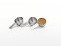 stainless steel measuring cups with brown sugar Royalty Free Stock Photo