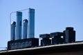 Stainless steel mechanical air vents on flat roof. blue sky and white cloud Royalty Free Stock Photo