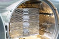 Stainless steel mesh basket placed in room automatic autoclave retort sterilization in food industry for manufacturing process Royalty Free Stock Photo