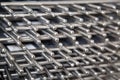 Stainless steel metal grilles stacked. Selective focus. Home inventory, design,