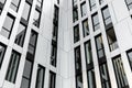 Stainless steel and mirrored glass facade of modern office building during golden hour Royalty Free Stock Photo