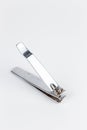 Stainless steel nail clippers isolated on a white background Royalty Free Stock Photo