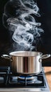 Stainless steel pot on gas stove emits swirling steam at home Royalty Free Stock Photo