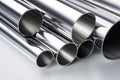 Stainless steel profiles and tubes on white background