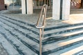 Stainless steel railings and metal stairways in city