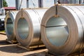 Stainless steel rolls. Rolls of steel sheet in the warehouse. A roll of galvanized steel sheet for the production of