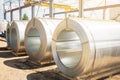 Stainless steel rolls. Rolls of steel sheet in the warehouse. A roll of galvanized steel sheet for the production of