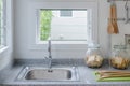 Stainless steel sink in modern kitchen Royalty Free Stock Photo