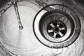 Stainless steel sink plug hole Royalty Free Stock Photo