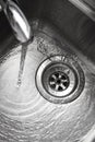 Stainless steel sink plug hole Royalty Free Stock Photo