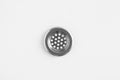 Stainless steel sink strainer on white background