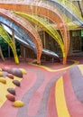 Stainless steel slider in the kid`s playground area. Children`s playing area indoor Royalty Free Stock Photo