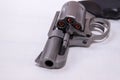 A stainless steel snub nosed 357 magnum revolver loaded with hollow point bullets Royalty Free Stock Photo