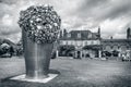 Stainless steel When Soak Becomes Spill Sculpture by Subodh Gupta in Choristers Square near Salisbury Cathedral, Salisbury, Wilt Royalty Free Stock Photo