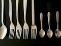 Stainless steel spoons and forks Royalty Free Stock Photo