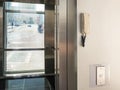 Stainless steel street elevator doors open Royalty Free Stock Photo