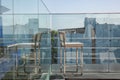 Stainless steel on sunny terrace with bay view and Royalty Free Stock Photo