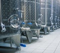 Stainless steel tanks for fermenting grapes. Winery interior